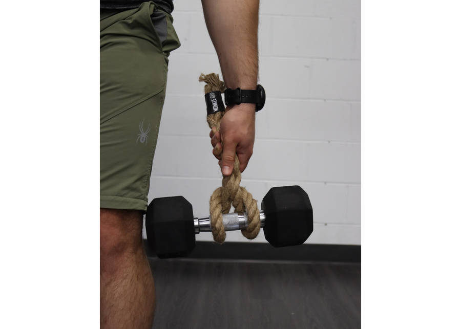 Authentic Monkee Grip equipment in use during a loaded carry.