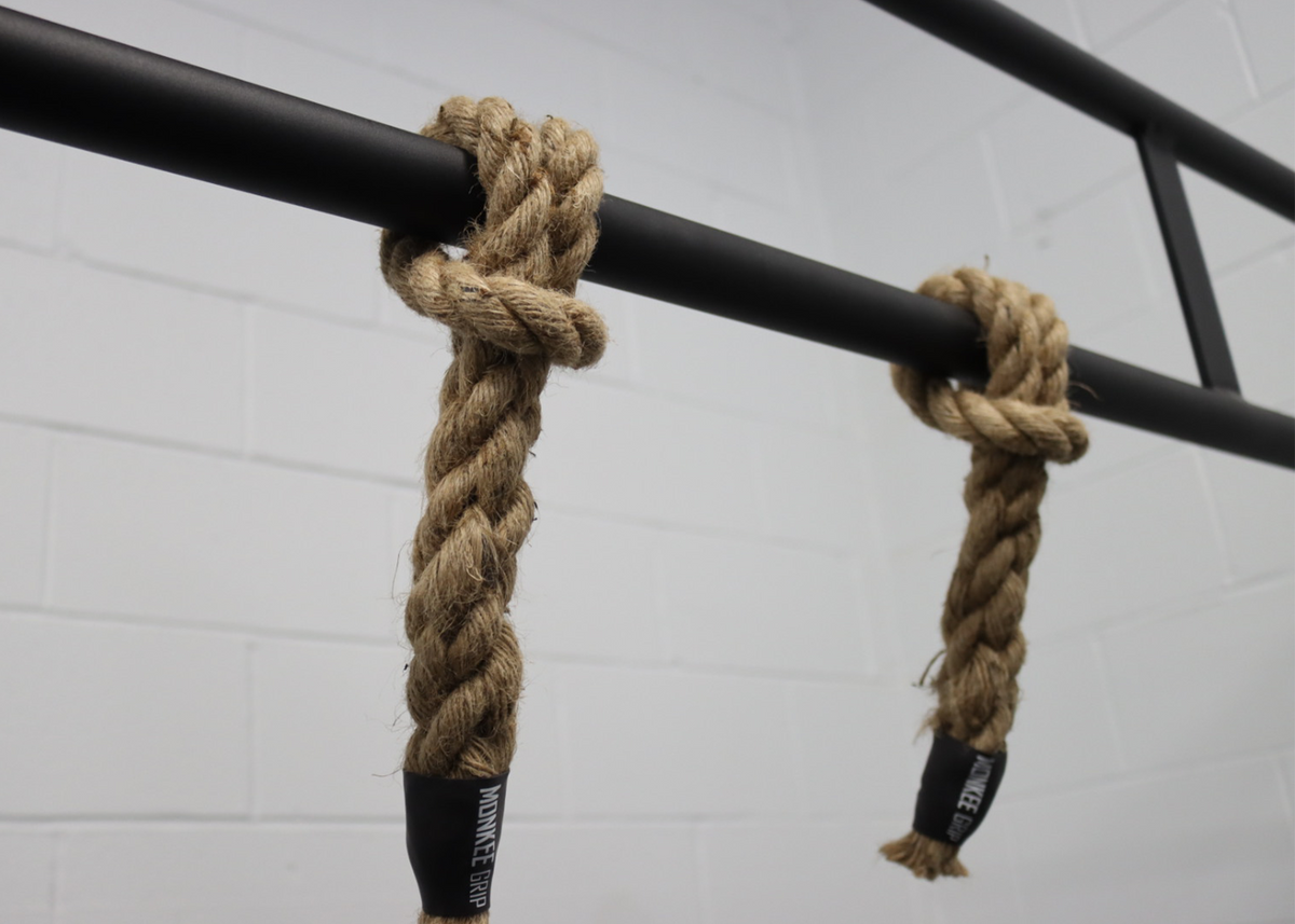 A pair of Monkee Grip rope grips attached to a pull-up bar